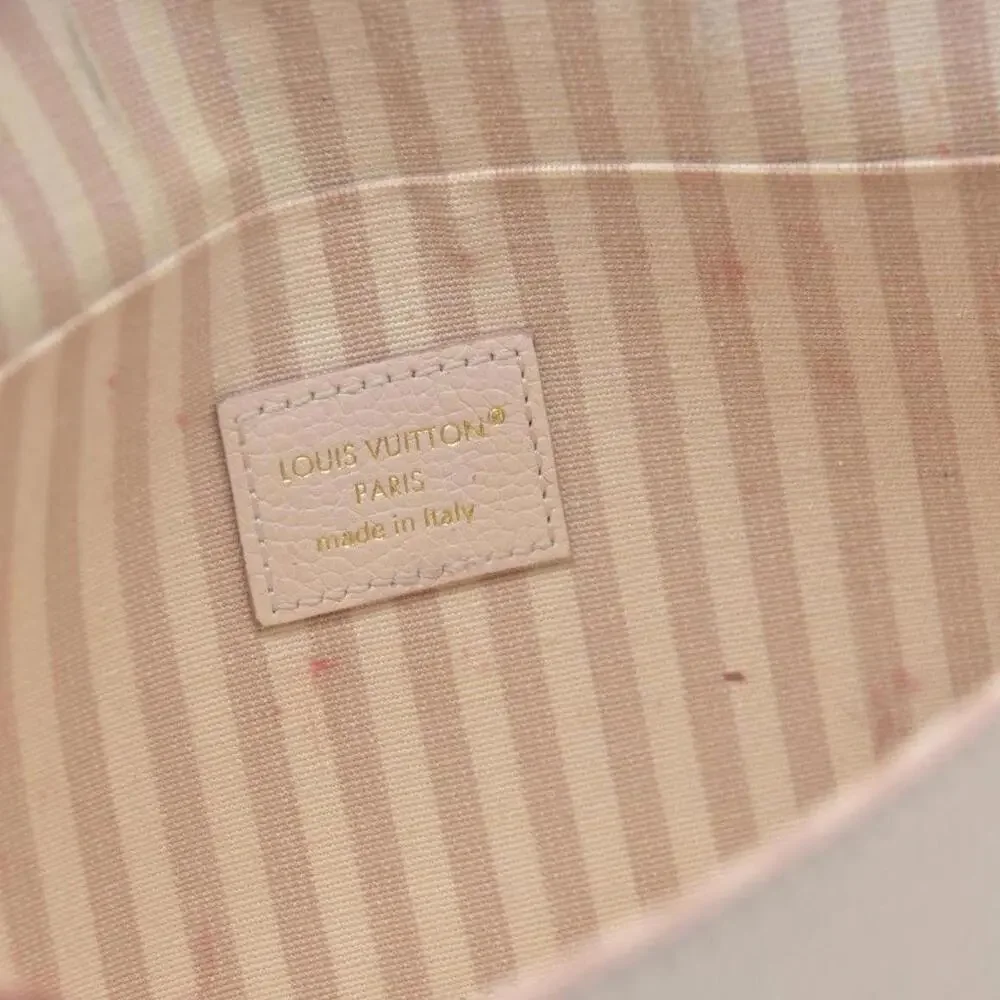 Louis Vuitton House's signature Monogram Pochette Felicie